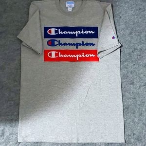 Champion Tee